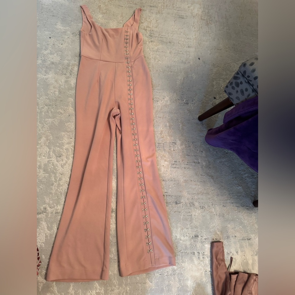 BEBE blush jumpsuit with crystal hook and eye detail